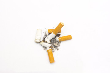 cigarette butts on a isolated white background close up composition photography