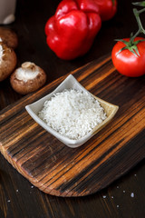 Beautiful white rice in a white ceramic bowl.