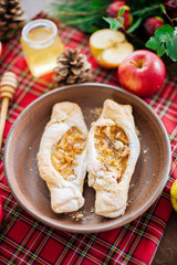 Baking with autumn fruits and honey. A table with autumn delicious. Apple pie with honey