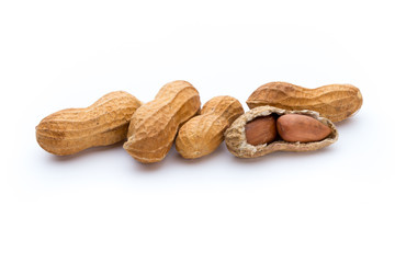 Dried peanuts on the white background.