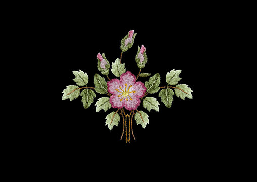 Embroidered bouquet of pink roses, buds and branch with green leaves on black background

