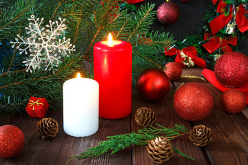 Christmas red balls, spruce branches, wreath and snowflakes on a background with a background Decoration for the holiday new year with copy space 