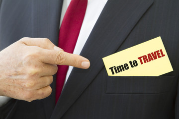 Businessman showing a card with text TIME TO TRAVEL.
