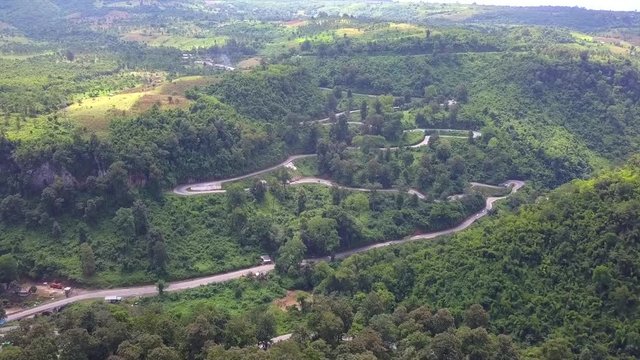 Aerial shot of some Mandalay-Lashio road No. 3 highway serpentines in Nawnghkio and valley with view around Goteik viaduct