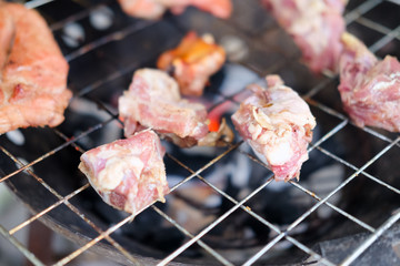 Pork rips grilled on the charcoal stove