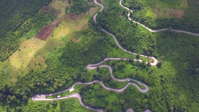 Aerial shot of some Mandalay-Lashio road No. 3 highway serpentines in Nawnghkio and valley with view around Goteik viaduct