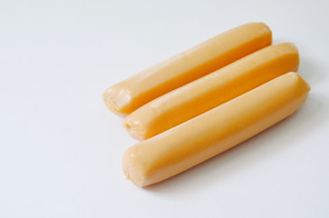 raw chicken sausage stuffed cheese on white background