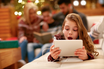 Girl watching something amazing on tablet