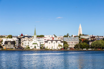 Reykjavik cityscape, with the bell tower of the Hallgrimskirkja church, viewed from across the...