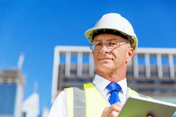 Engineer builder at construction site