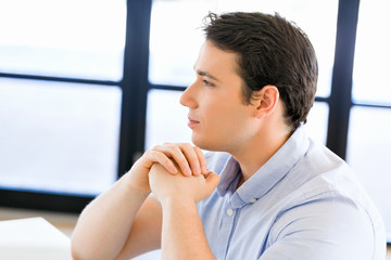 Pensive businessman at office