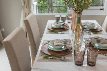 contemporary style dining room with table set
