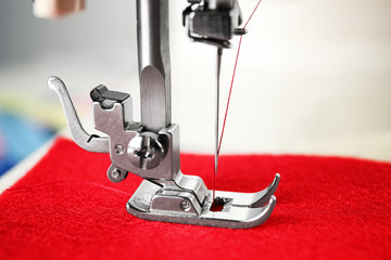 Sewing machine on table, closeup