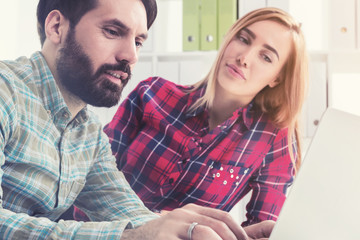 Two designers working together, office