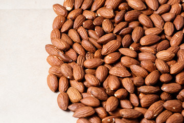 peeled almonds in background