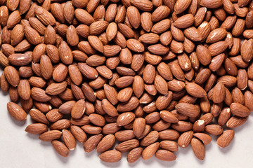 peeled almonds in background