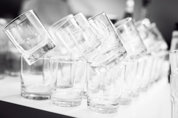 Transparent glasses in a row