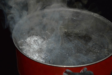 top view of two eggs boiling in water 