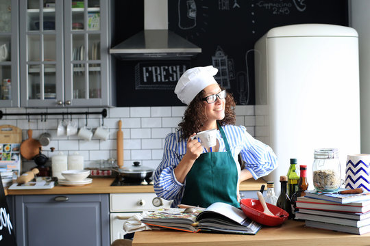 Beautiful woman preparing food in the kitchen