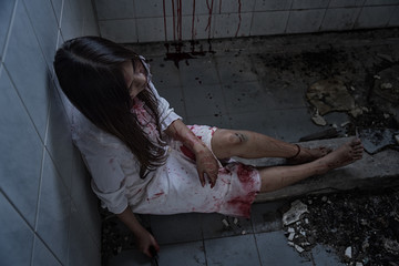 Ghost woman holding knife in room house