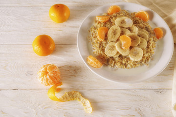 Oatmeal with fruit for breakfast