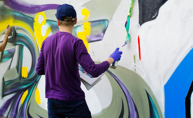 Graffiti on a fence.