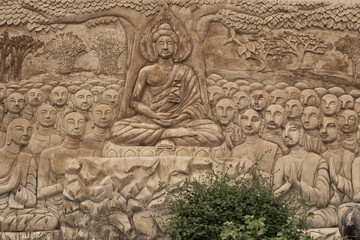 The story carvings on the wall in Buddha