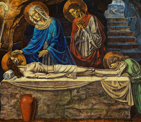 Naklejka premium Jesus Christ lying death in his grave, with his mother Mary