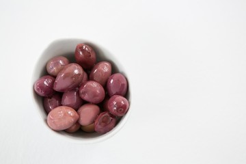 Close-up marinated olives in bowl