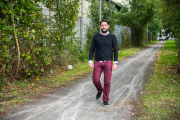 Fototapeta premium man is walking on the street