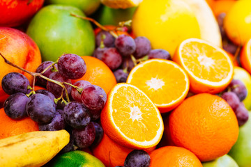 Naklejka na ściany i meble Grape, oranges, apples closeup