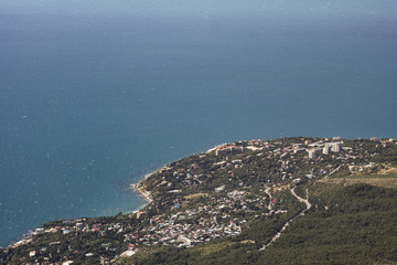 view from the height of the resort town of Yalta and the Black Sea from the mountains of Ai-Petri