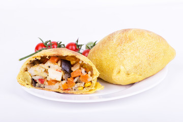 Samos with vegetable and rice filling on a white background