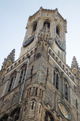 A view of the bell tower of the cathedral. The medieval architecture of Bruges, Belgium