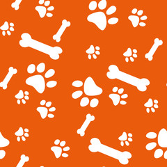 Vector seamless pattern with cat and bone footprints.Orange background. Can be used for wallpaper, web page background, surface textures.