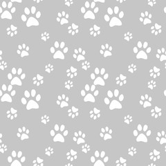 Vector seamless pattern with cat footprints. Can be used for wallpaper, web page background, surface textures.