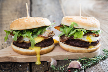 Hamburgers with fried egg and bacon