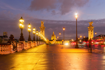 Fototapeta na wymiar Alexandre III Bridge at violet twilights, Paris, France