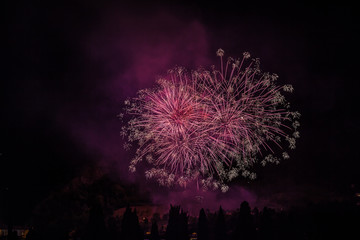 Colorful fireworks of traditional Santa Augusta celebration, Vittorio Veneto, Italy