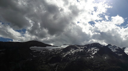 Shadows On Clouds Over The Mountans