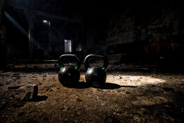 Cross Fit workout equipment in abandoned factory