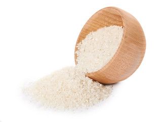 raw Jasmine rice in wooden pot isolated on white background