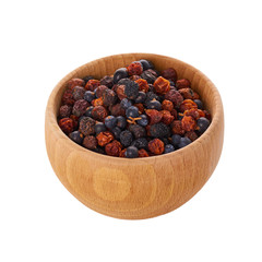 healthy dried berries in wooden pot isolated on white background