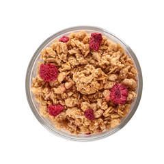 homemade granola with dried fruits in glass cup isolated on white background