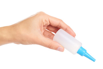 White glue container in hand isolated on a white background