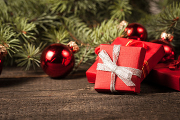 Luxury New Year gifts, different present boxes under Christmas tree in holiday eve, Christmastime celebration, home decorated with festive shiny balls, magic night