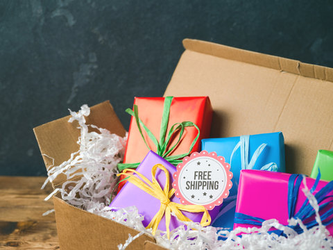 Free shipping concept with cardboard box and gift boxes