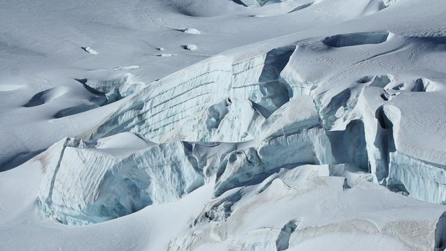 Detail of the Aletsch glacier. Crevasses and layered ice.