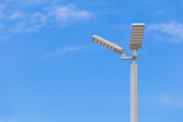 LED street light pole on blue sky with cloud