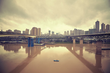 Retro stylized picture of Chongqing waterfront, China.